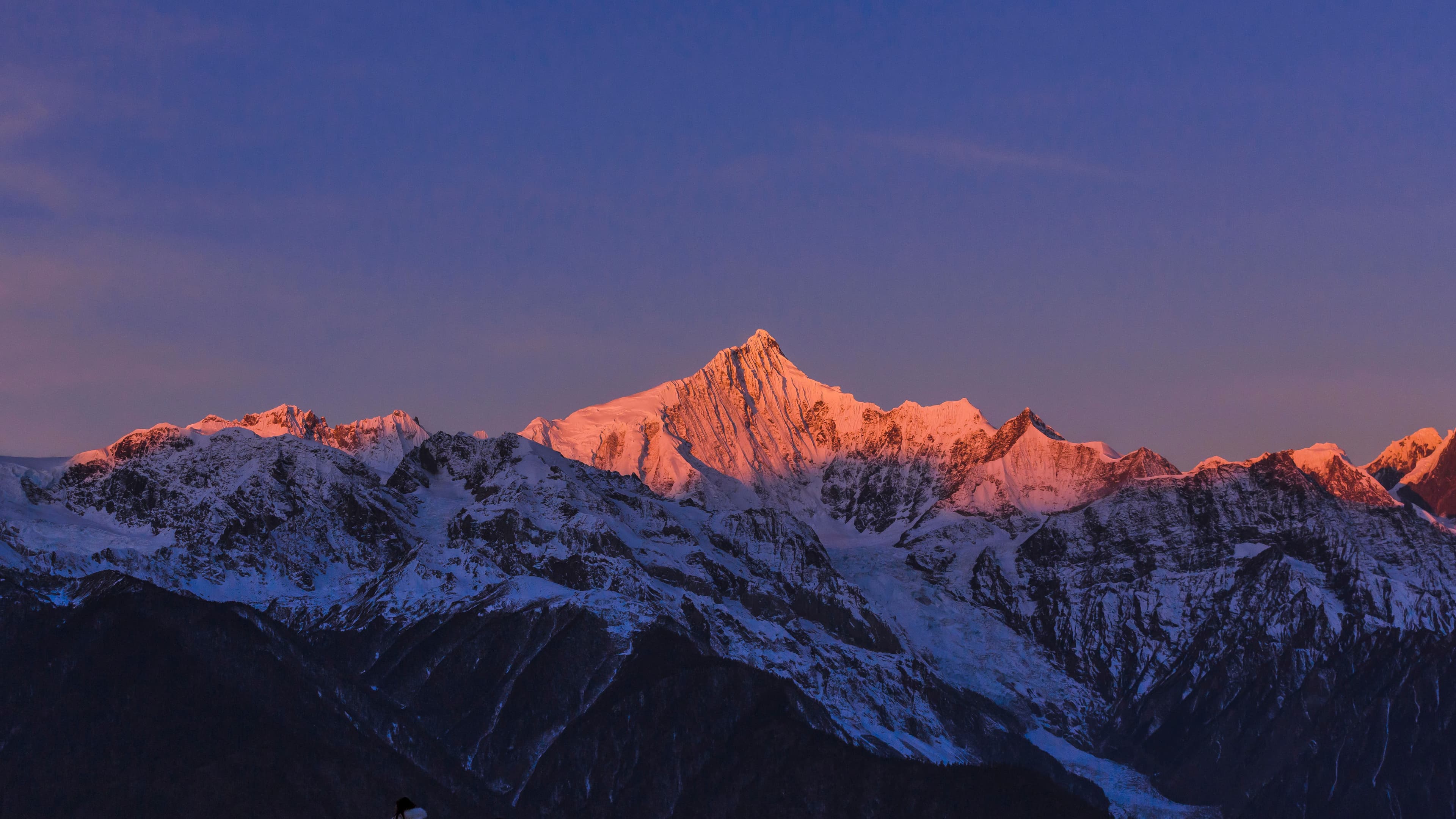 Leave the mountains you have traversed in the light.