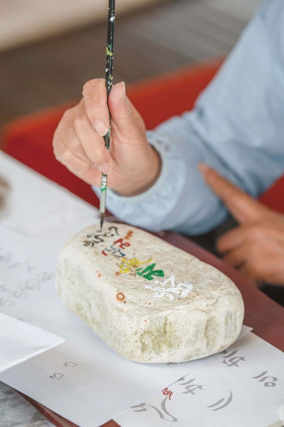 Mani Stone Painting at Songtsam Lodge Bome